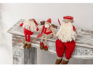 Detailed trio of plush Christmas shelf sitters featuring Santa and reindeer on wood