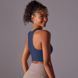 Rear view of deep blue racerback sports bra with high-waist yoga leggings
