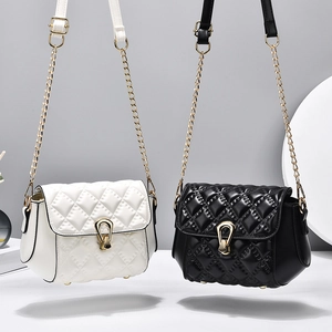 Quilted crossbody bag with gold chain strap in black and white colors for women