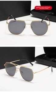 Detalle de gafas de sol geométricas con montura dorada y lentes grises polarizadas