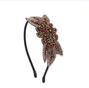 Detailed handmade bronze floral beaded headband with intricate rhinestones and beads