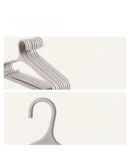 Detail view of seamless plastic hanger featuring non-slip windproof hooks for storage