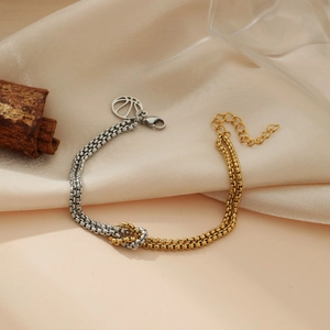 Two-tone silver and gold layered stainless steel bracelet with basketball charm and knot