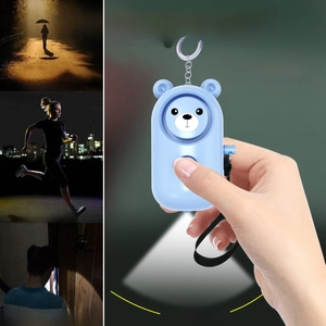 Safety LED flashlight and personal alarm in blue bear shape with key ring and wrist strap