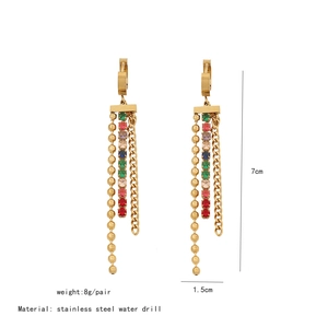 Detail view of long tassel rhinestone earrings with dimensions and material specs