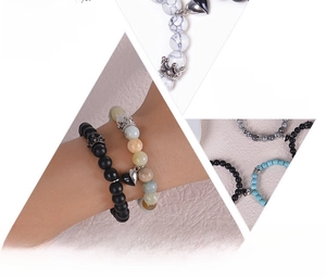 Detail of natural stone beaded bracelets featuring magnetic heart clasps and crowns
