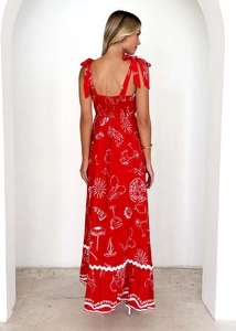 Detail of red floral maxi dress with back smocking and tie shoulder straps