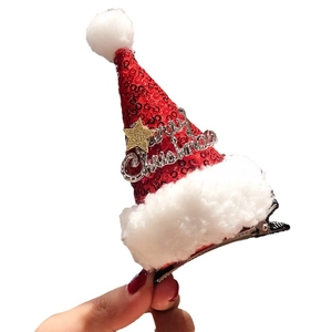 Red sequin Christmas hat hair clip with silver Merry Christmas text and gold star charm