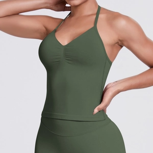 Detail of olive green seamless knitted sports top with halter V-neck and ribbed texture