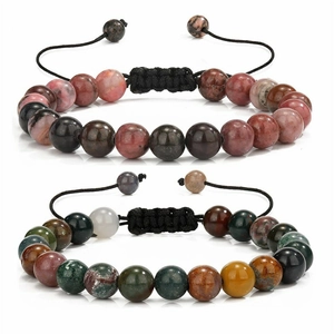Macro view of 8mm natural stone beaded bracelets with adjustable black braided cords