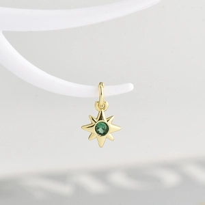 Exquisite gold-plated eight-pointed star pendant with a brilliant green zircon stone