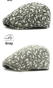 Detailed texture of black and grey patterned ivy caps in casual ethnic beret style