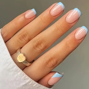 Classic French mid-length square press-on nails with light blue tips and heart ring