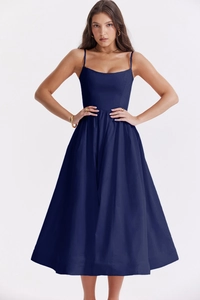 Detail of navy blue backless maxi dress with slim waist and flowing skirt design