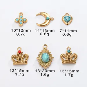 Detailed size guide for titanium steel pendants including moon, crown, and heart shapes