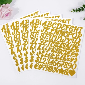 Detailed set of 1 inch gold glitter alphabet and number stickers for DIY crafts