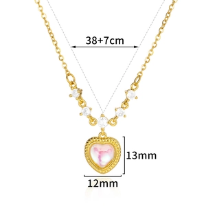 Detail showing pink heart pendant dimensions 12x13mm with 38+7cm gold necklace chain