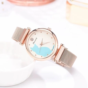 Close-up of rose gold watch featuring a light blue cat silhouette and mesh strap band