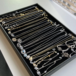 Collection of S925 sterling silver necklaces and bracelets featuring Hamsa and Evil Eye motifs