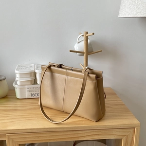 Minimalist khaki PU leather tote bag with soft texture and large capacity for women