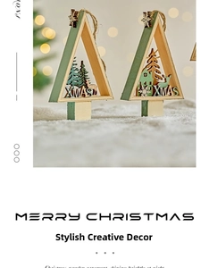 Close-up of wooden XMAS tree ornaments with laser-cut reindeer and forest silhouettes