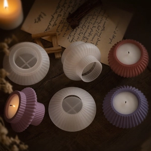 Detail of candle silicone mold with textured stripe design and DIY resin finished products
