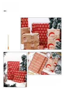 Détails du papier cadeau de Noël avec Père Noël, flocons et corde en jute sur coffrets