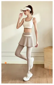 Detail of high-elastic breathable yoga set featuring color-block bra and skirt leggings