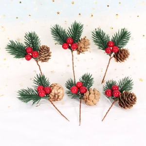 Detailed view of 6 artificial pine needles with red berries and natural pine cones