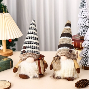 Pair of lighted coffee gnomes with knitted hats and gift bags for cozy home decor