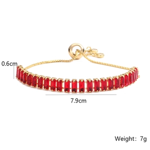 Detail of gold plated bracelet with red zircon showing 0.6cm height and 7.9cm length