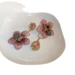 Vintage gold earrings with purple embroidery flower petals and champagne crystal drops