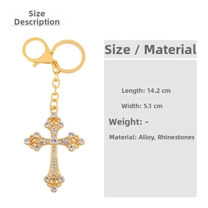Detailed size chart for the gold cross keychain featuring sparkling white rhinestones