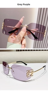 Detailed view of grey purple gradient lenses and golden temple with floral cutout logo