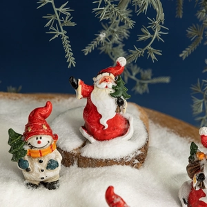 Christmas resin figurines with Santa and Snowman on a wooden base for holiday home decor