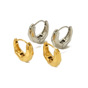 Lava texture stainless steel hoop earrings in gold and silver with high-polish finish