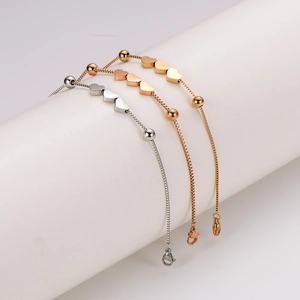 Adjustable heart charm bracelets in silver, gold, and rose gold stainless steel