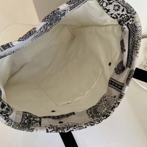 Internal view of the cotton linen tote bag featuring magnetic buckle and open pocket