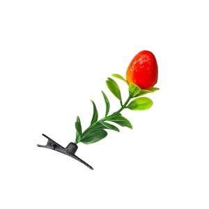 Creative 3D sprout hair clip featuring green leaves and a red fruit on black duckbill clip