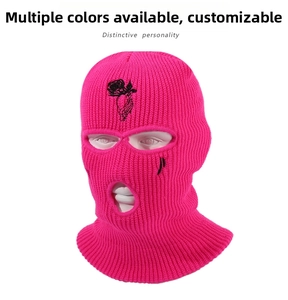 Detail of hot pink 3-hole balaclava with black rose and praying hands embroidery