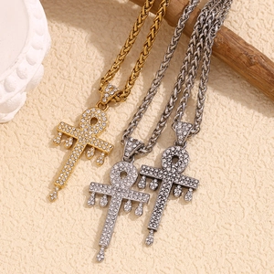 Iced out Ankh cross pendant necklace in 18K gold and silver finish with crystal stones