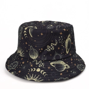 Detailed pattern of celestial bodies and snake print on black reversible bucket hat
