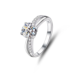 Macro detail of S925 sterling silver ring featuring four-prong moissanite setting