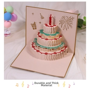 3D pop-up birthday card featuring a detailed three-layer cake with candle and fireworks