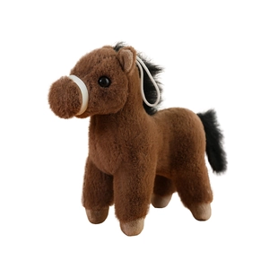 Cute brown plush horse toy with black mane and tail standing against a white background