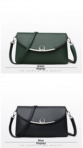 Detail view of lychee pattern PU leather crossbody bags with metal ring buckle and heart motif
