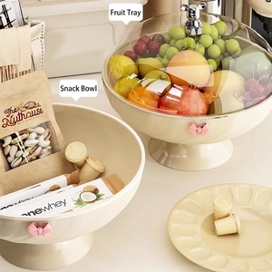 Creamy round fruit tray with pink bow relief and bear lid on a light luxury style base