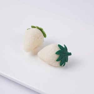 Realistic white PVC strawberry model with green leaves for professional photography props