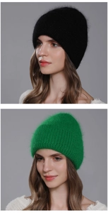 Detailed texture of fuzzy angora knit hats in black and vibrant green colors