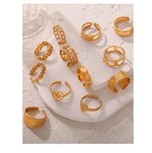 Detailed view of 11-piece 18k gold-plated titanium steel adjustable ring set with heart motifs